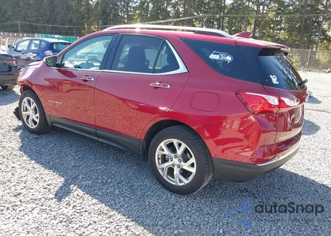 2018 Chevrolet Equinox Premier z USA, uszkodzony, nr VIN 2GNAXVEV4J6134592